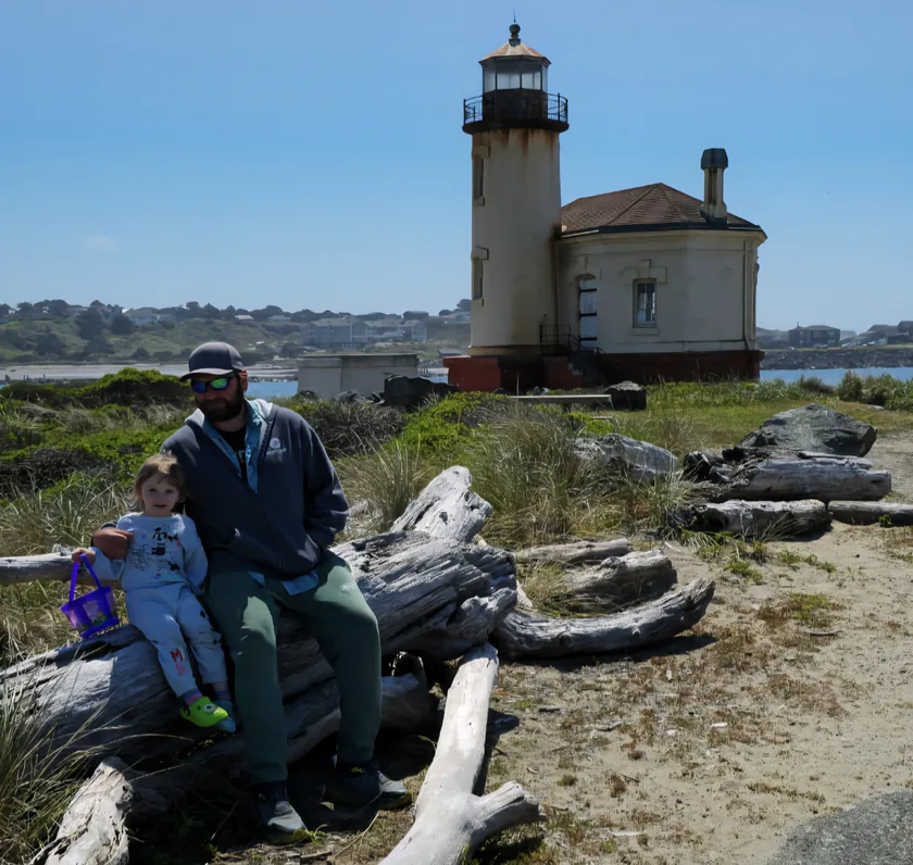 Preston Winters with his daughter at the Coquille River Lighthouse, Bandon, Oregon.